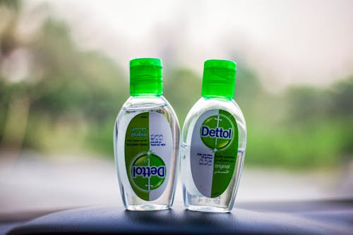 Two Green and White Dettol Plastic Bottles