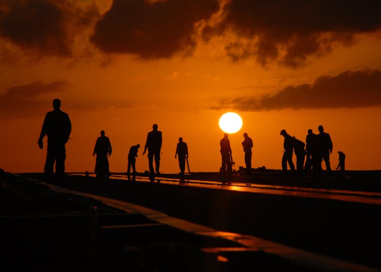 Silhouette Of People During Daytime