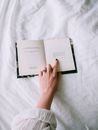 Woman Hand Holding Book