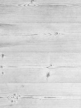 High-resolution image of a whitewashed wooden plank texture, ideal for backgrounds and design.