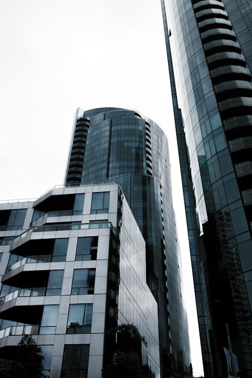 Free Gray Concrete Building Under White Sky Stock Photo