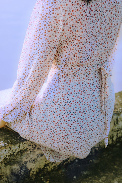 Woman in Red and White Polka Dot Dress