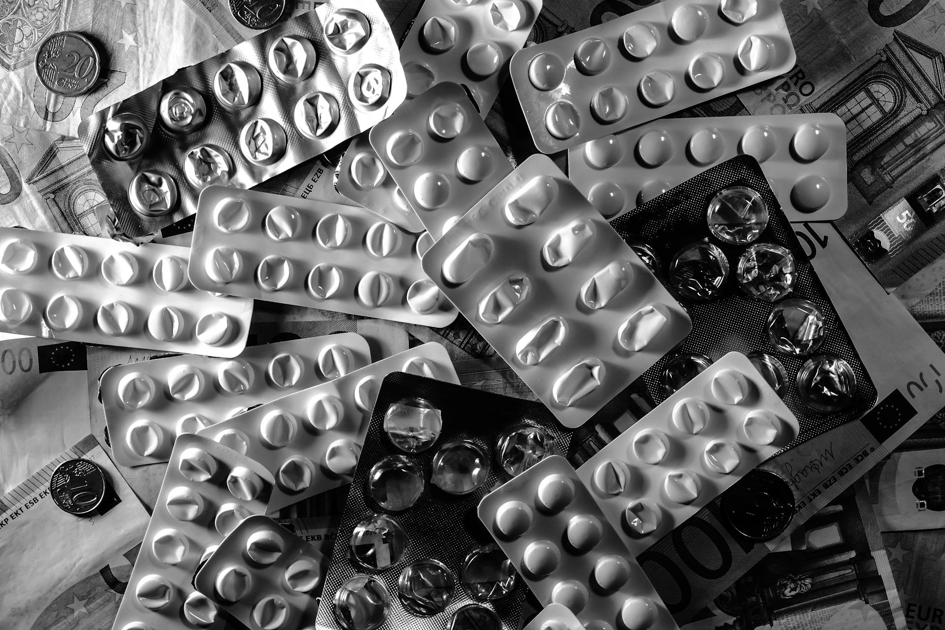 Empty Blister Packs in Grayscale Photography