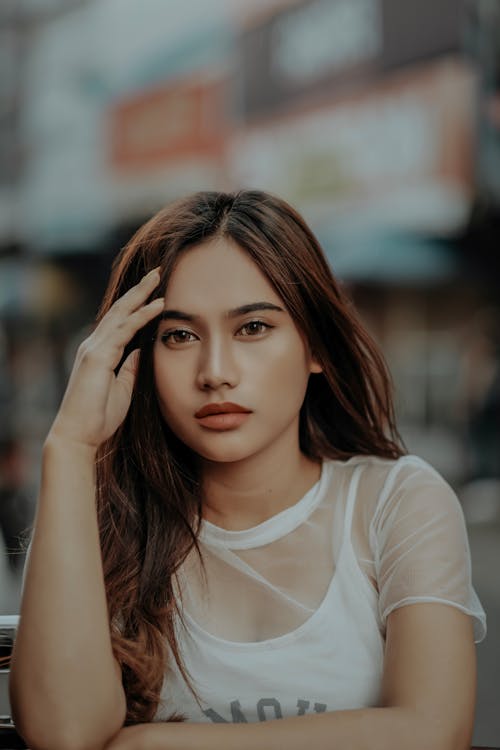 Woman in White Long Sleeve Shirt