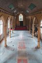 Bright hall in old cathedral with shabby walls