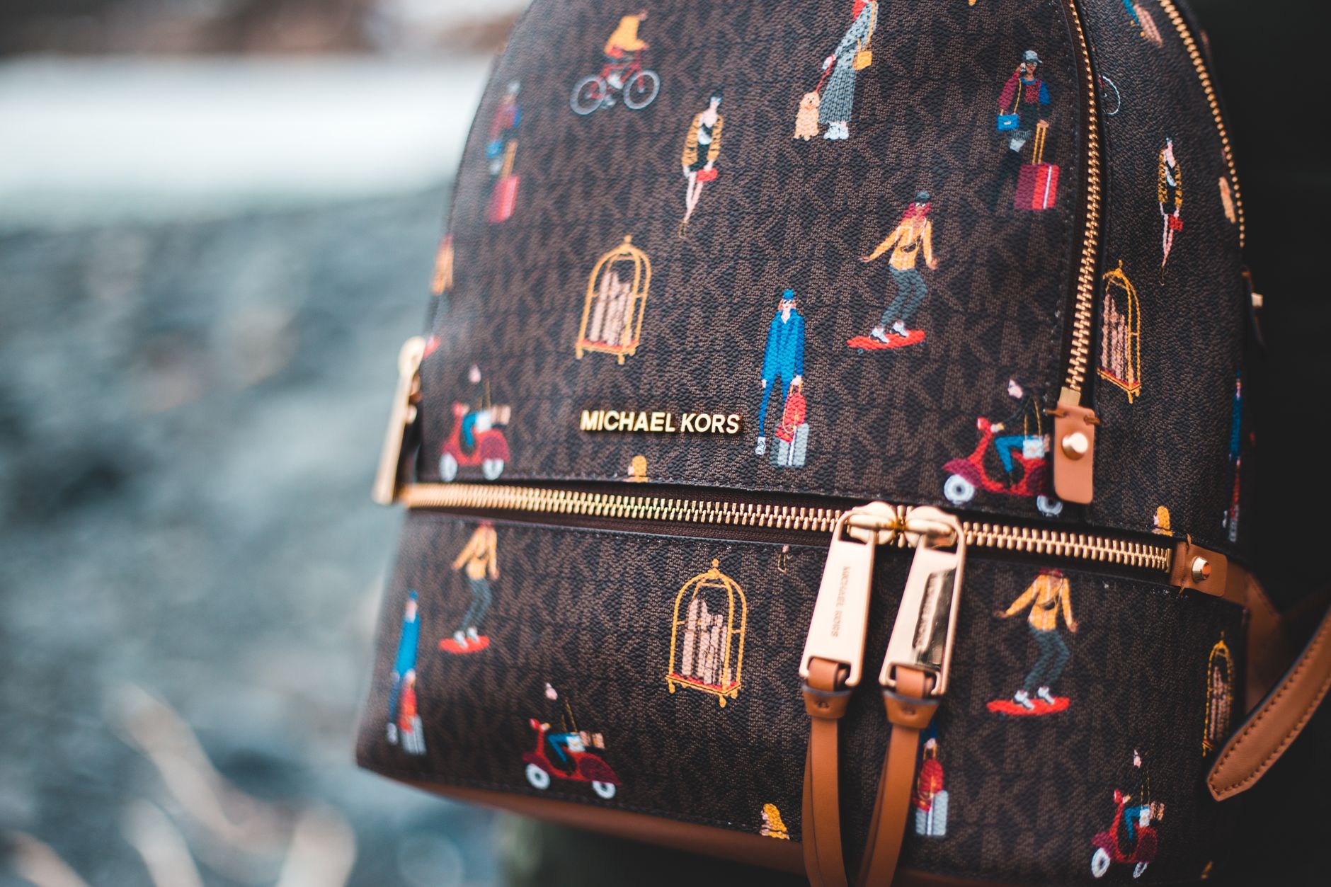 Michael Kors bag at a coffee shop