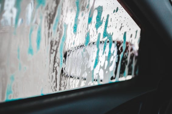 Foamy smudges on surface of window