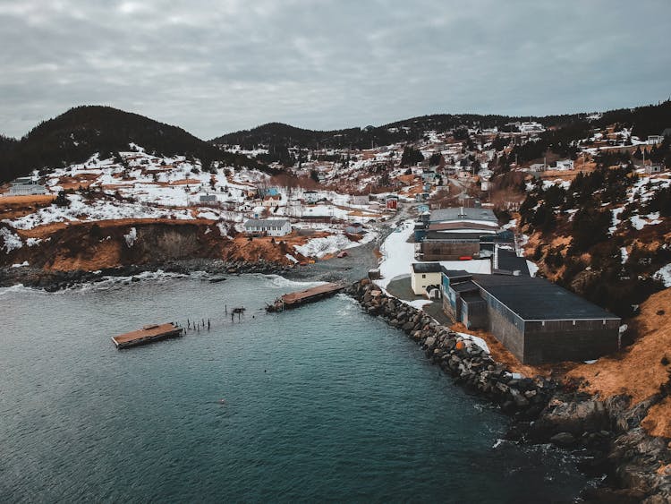 Port City Surrounded By Sea And Mountains