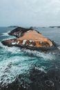 Brown Rock Formation on Sea