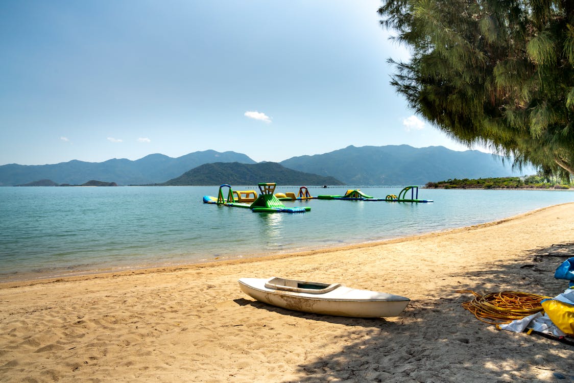 White Boat on Sandy Beach