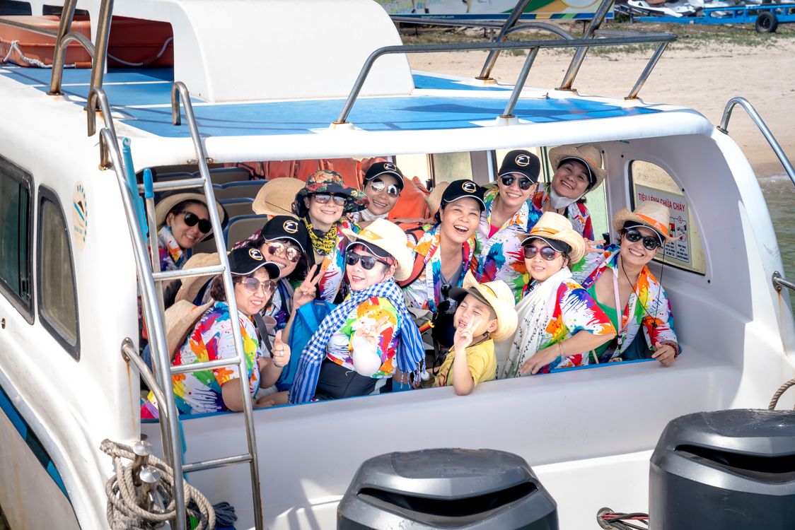 Group of People Riding on White Boat · Free Stock Photo