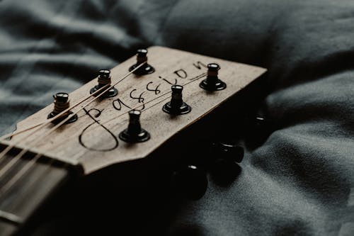 Guitar on Black Textile