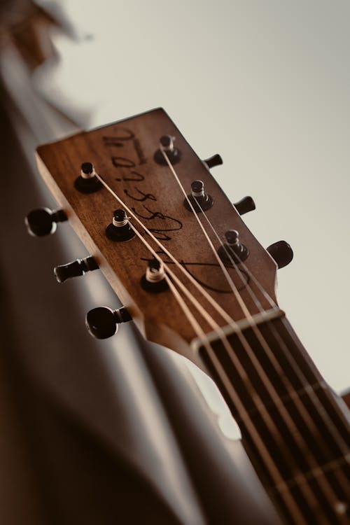 Free Brown and Black Guitar Headstock Stock Photo