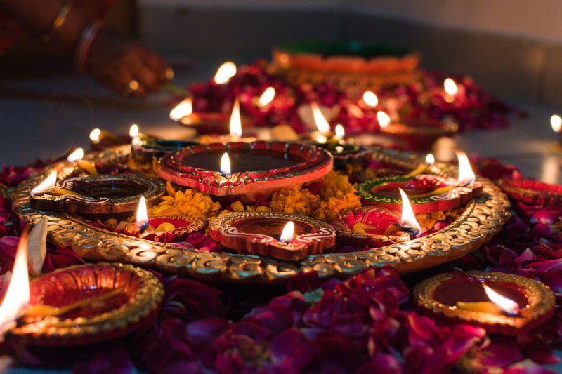 Diwali diya decoration with marigold flowers