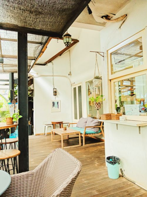 Free Inviting café interior with modern and cozy design in Jakarta, Indonesia. Stock Photo