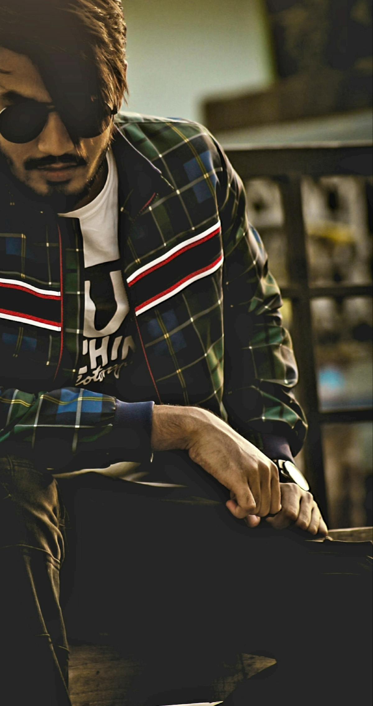 Person walking outdoors wearing a fitness tracker