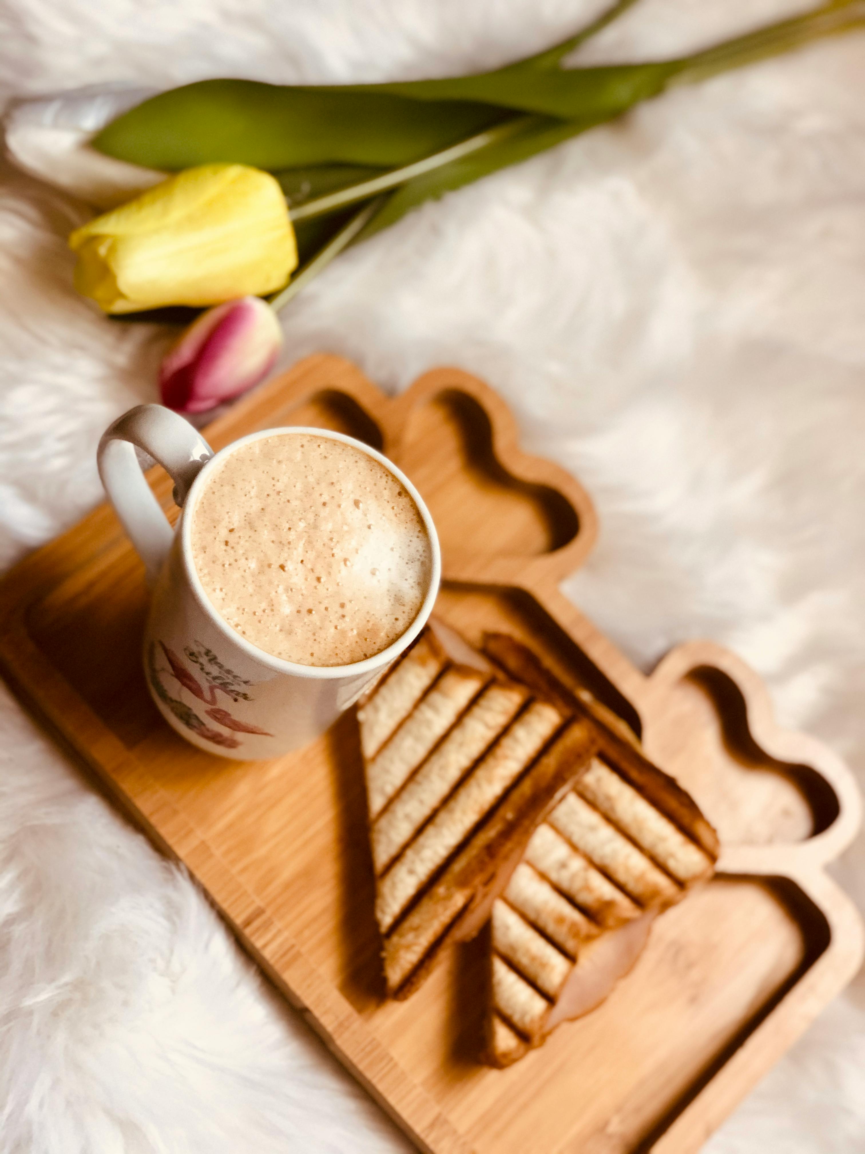 White ceramic mug on brown wooden coaster photo – Free Coffee cup Image on  Unsplash