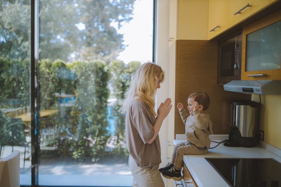 Photo by Anastasia Shuraeva on Pexels A joyful moment of a mother and child playing together in a bright kitchen. - Photo by Anastasia Shuraeva on Pexels