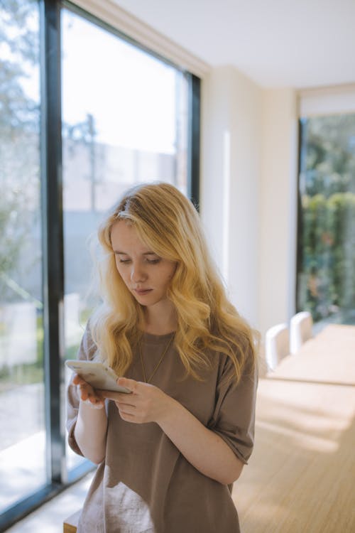 Woman Texting on her Smartphone