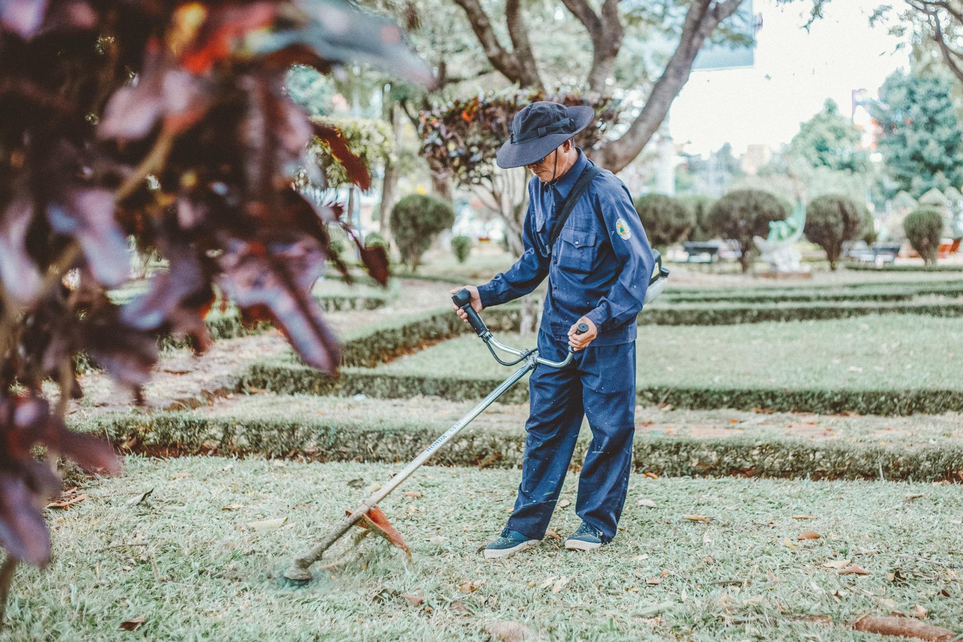 Man Cutting Grass