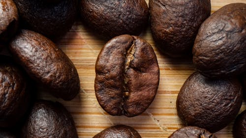 Fresh Roasted Coffee Beans Brown Wooden Table