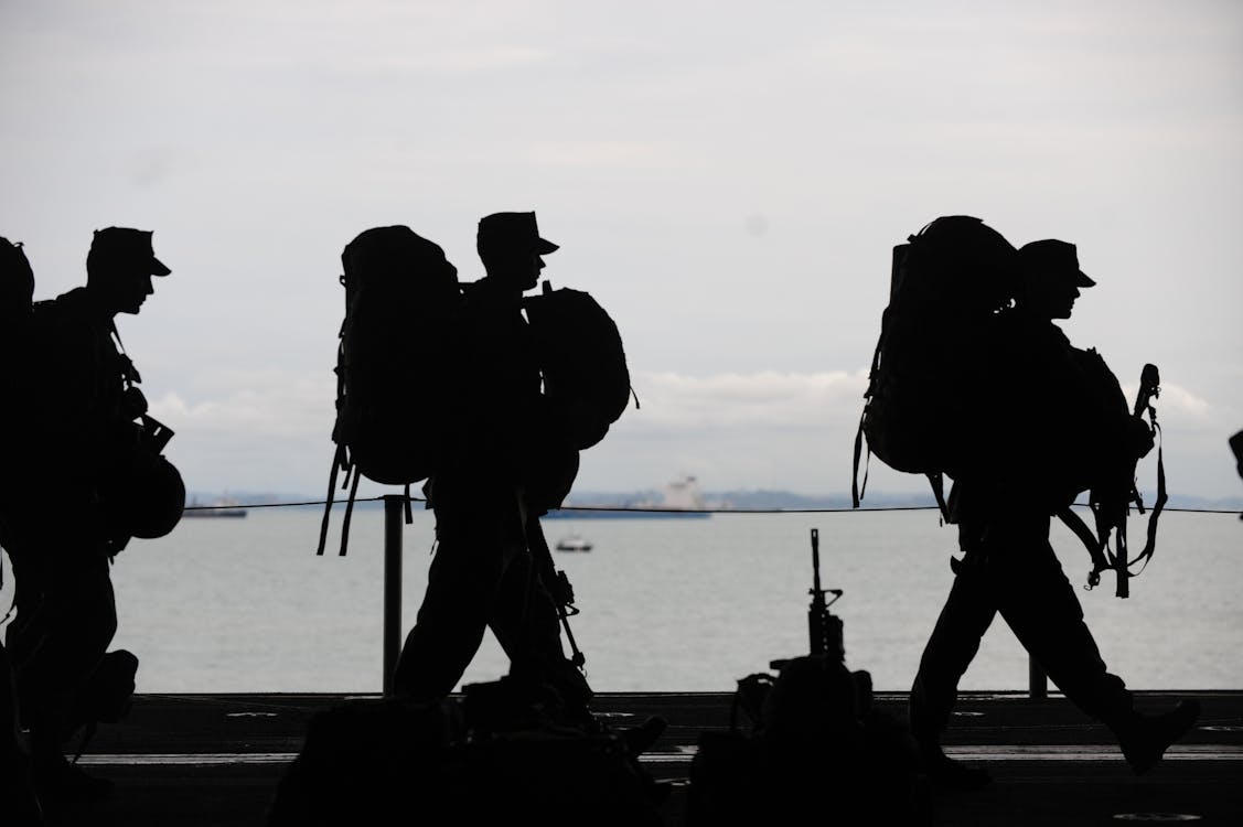 Free Silhouette of Soldiers Walking Stock Photo