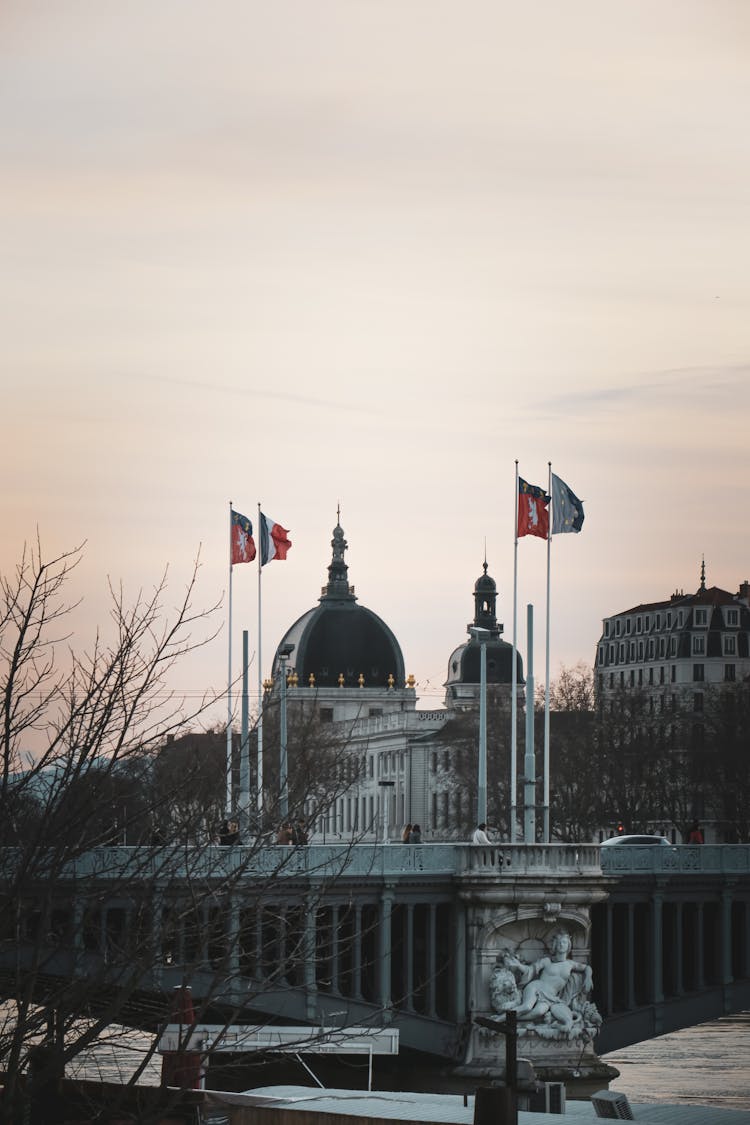 White Concrete Building With Flag Of Us A