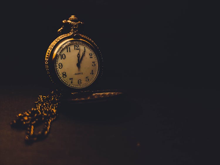 Stylish Old Fashioned Clock On Dark Background