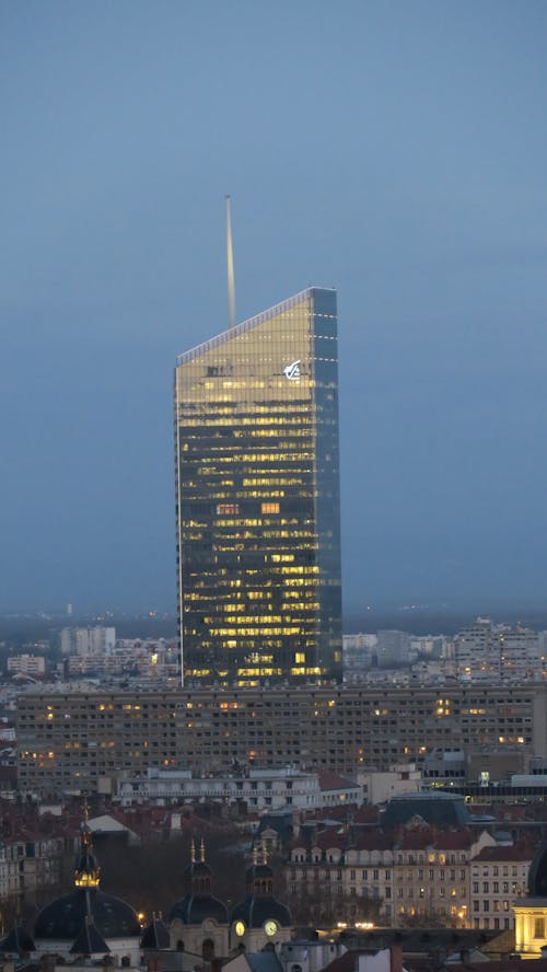 Aerial Photography of a High Rise Building during Nighttime