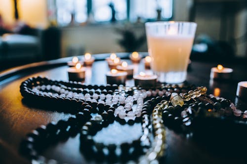 Clear Glass with Candle on Table