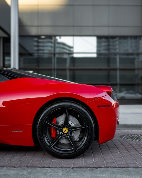 Black Wheel on Red Car