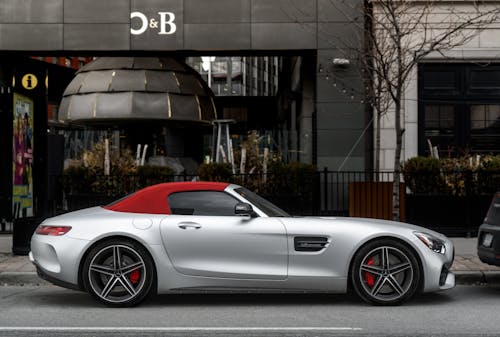 Free Silver Mercedes Benz Parked Near Brown Building Stock Photo