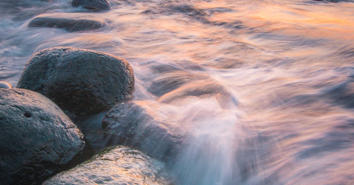Time Lapse Photography of Water Splash on Rocks · Free Stock Photo