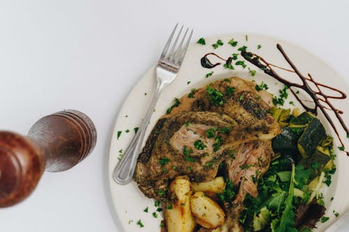 Cooked Food on White Ceramic Plate