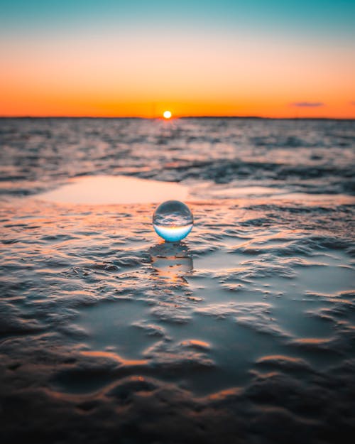 Glass Ball on Body of Water