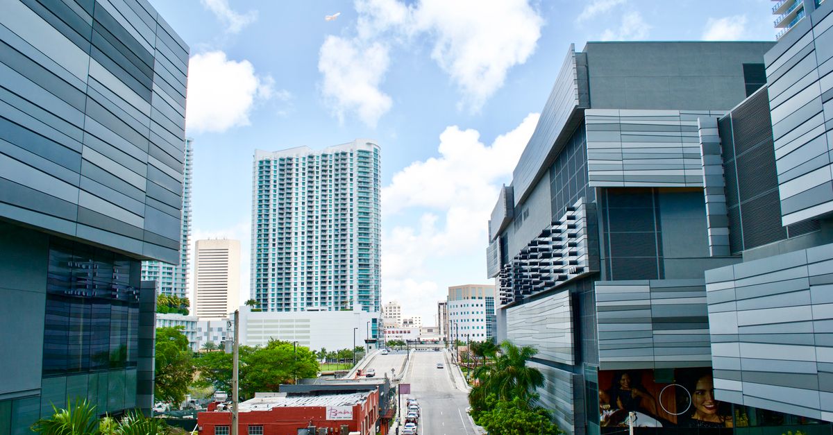 From above of contemporary futuristic buildings located in street of modern city district