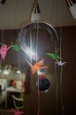 Decorative question symbol and festive paper figures at home