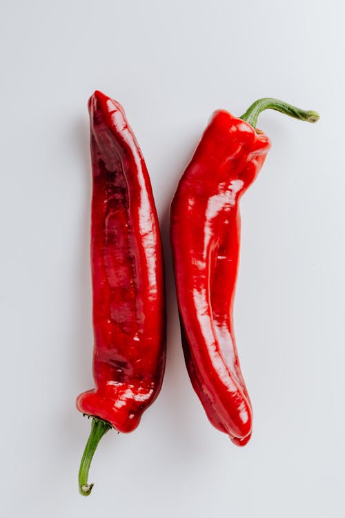 Red Chili on White Surface