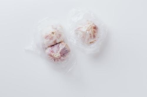 White Garlic on Clear Plastic Bag