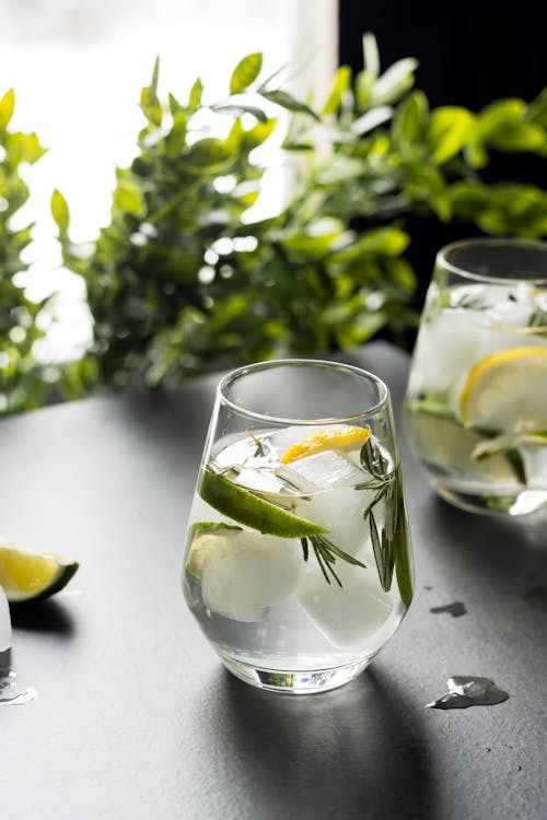 Clear Drinking Glass With Sliced Lemon