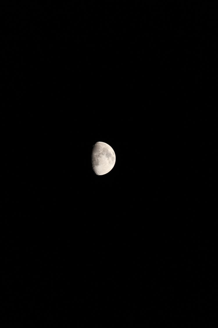 Half Moon On Black Sky At Night