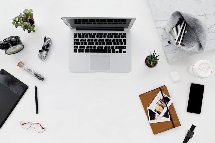 Gray Laptop On The Table