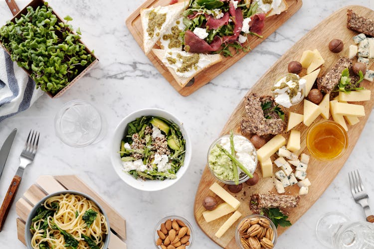 Variety Of Food On Wooden Trays