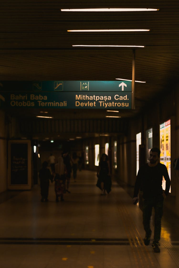 People Walking In Subway Station