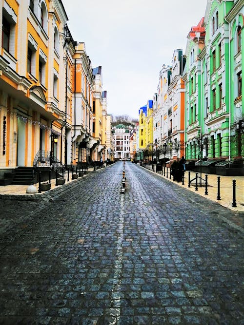 Free stock photo of city street, cobblestone street, colorful