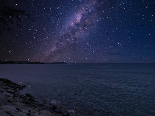 Amazing starry sky with Milky Way galaxy over sea at night