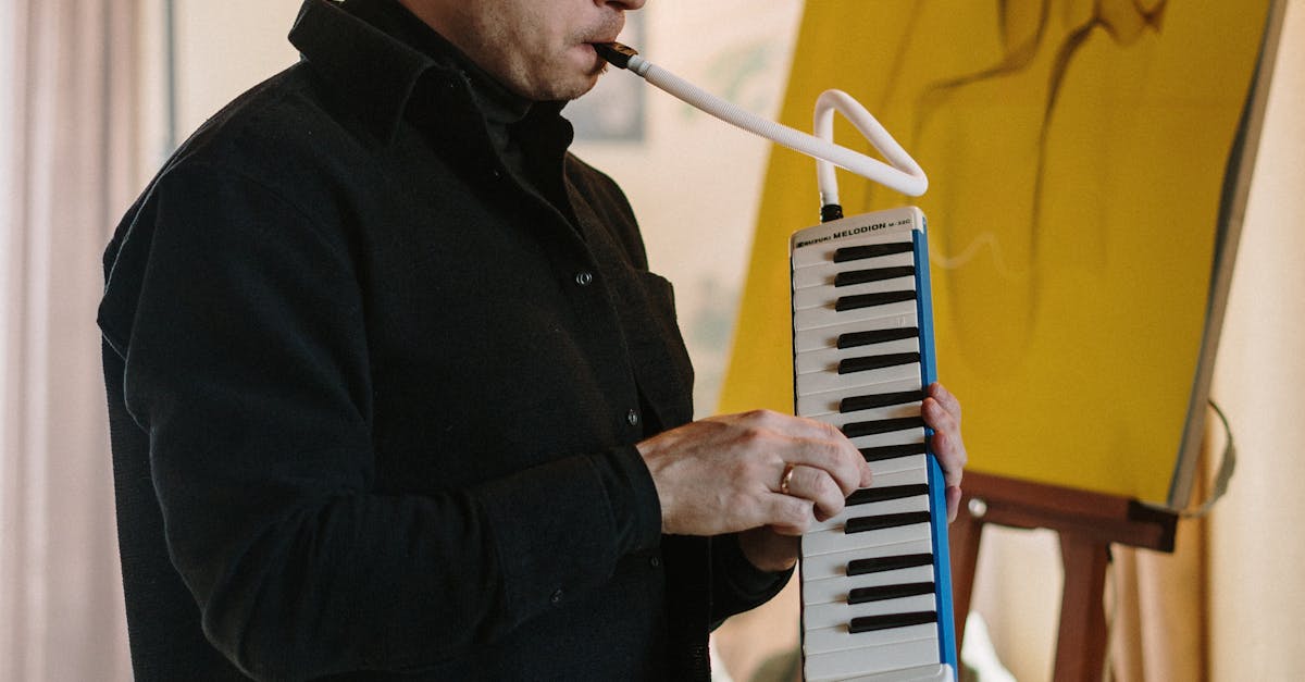Man in Black Jacket Playing Piano · Free Stock Photo
