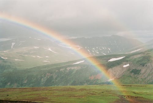Free Rainbow on a Cloudy Day Stock Photo