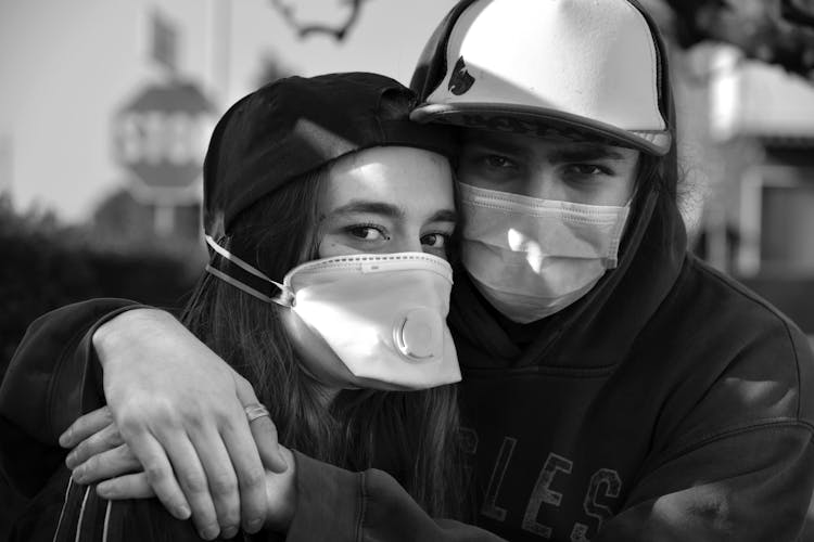 Close-Up Shot Of A Couple Wearing Facemasks