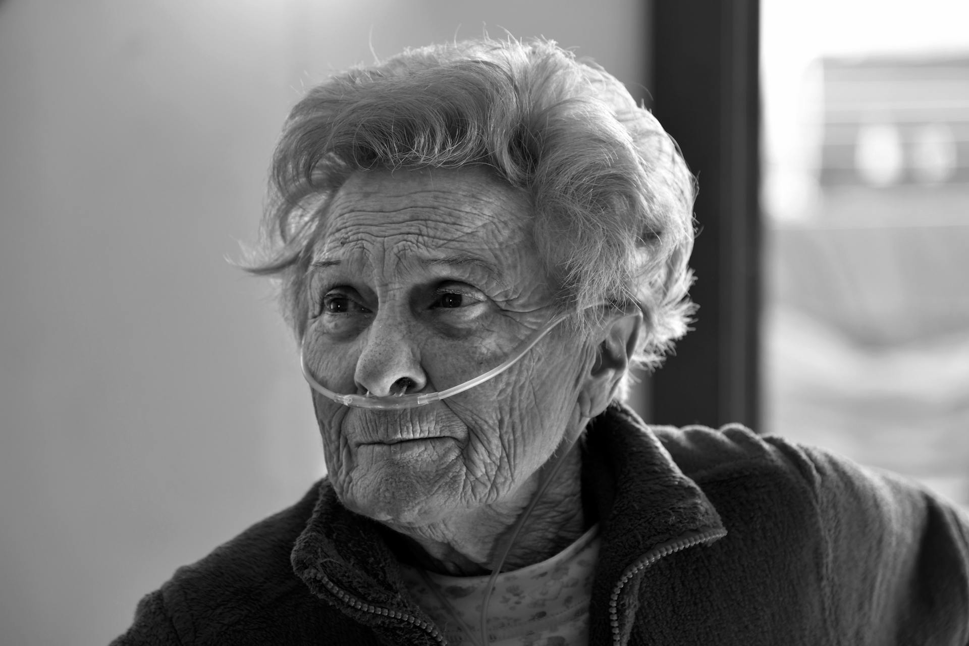 Monochrome of an Elderly Woman with Nasal Cannula